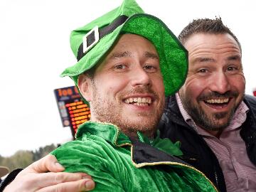 Two race goers enjoying the Midlands Grand National and St Patricks Day