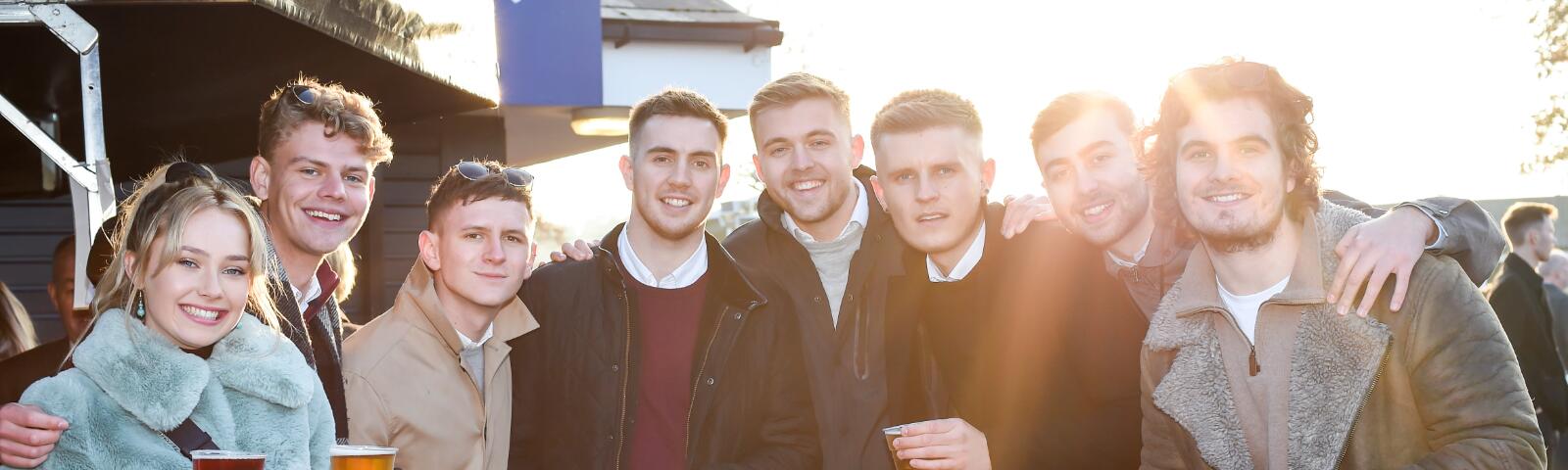 A large group of friends enjoy the races at Uttoxeter