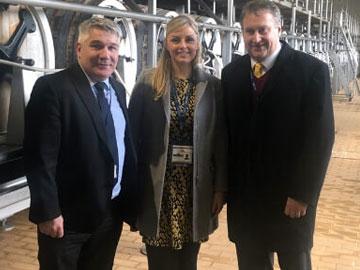 Marstons representative posing for a photo with members of the Uttoxeter team for a photo.