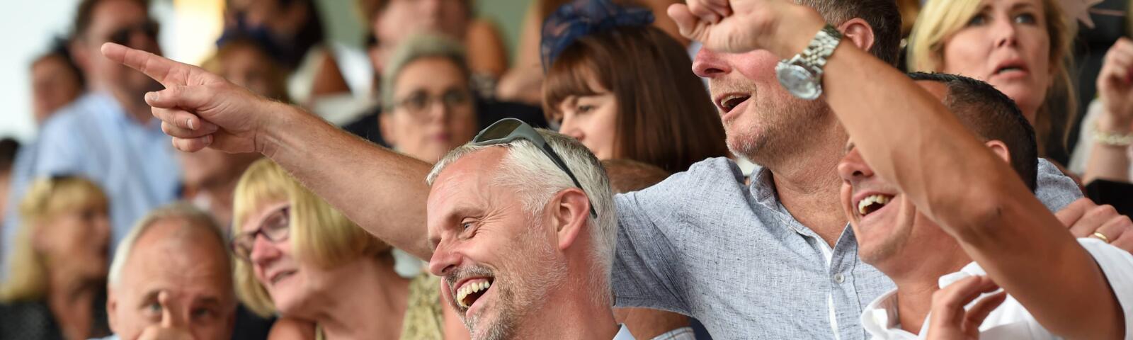 A group of gentlemen enjoying the racing at Uttoxeter Races